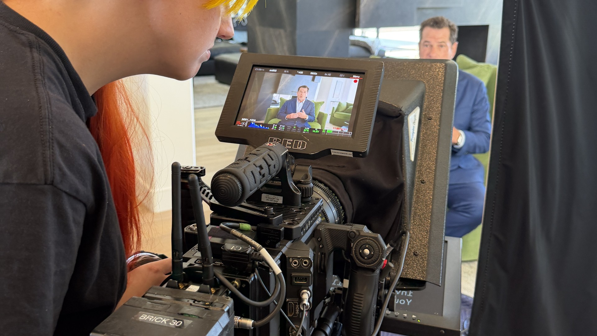 Acrisure 1 Vertical video production on set for Acrisure, RED camera and monitor