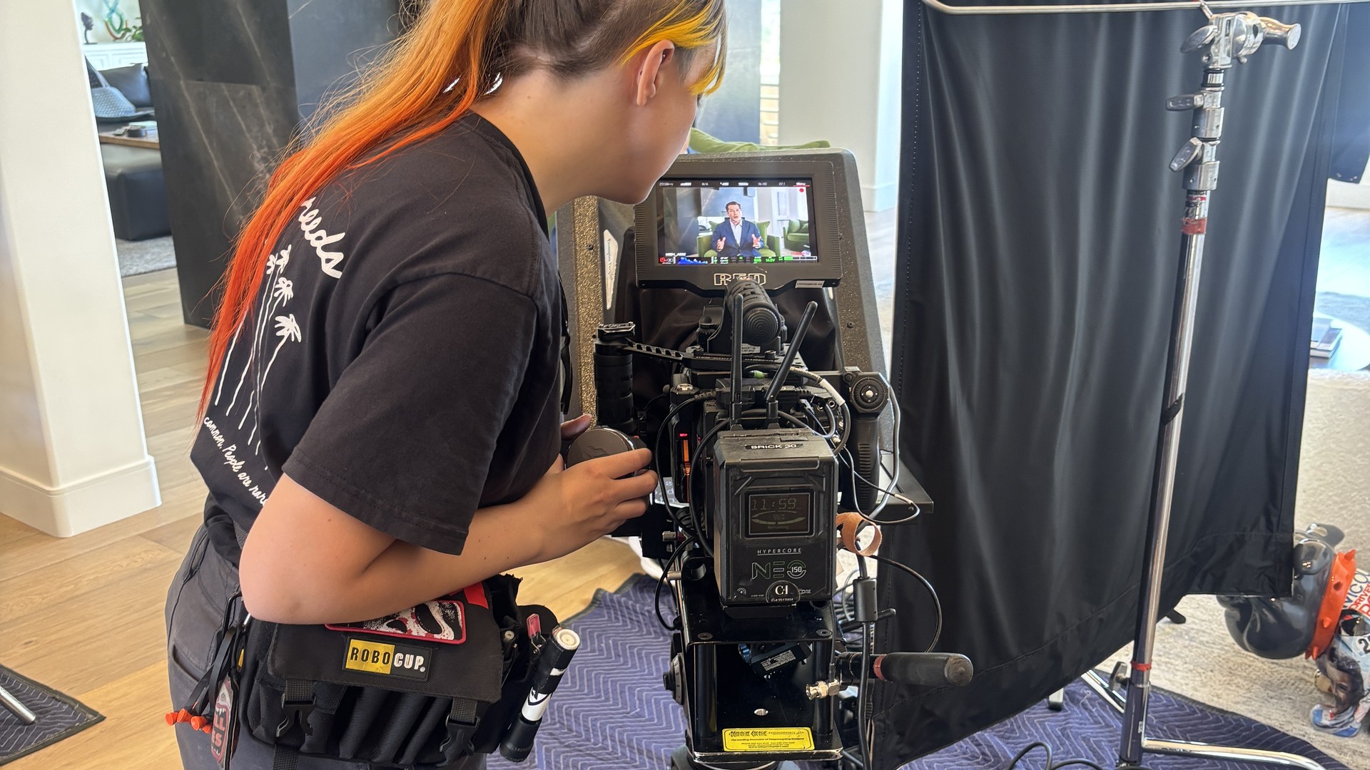 Acrisure 4 Camera operator on the RED during the Acrisure vertical video production