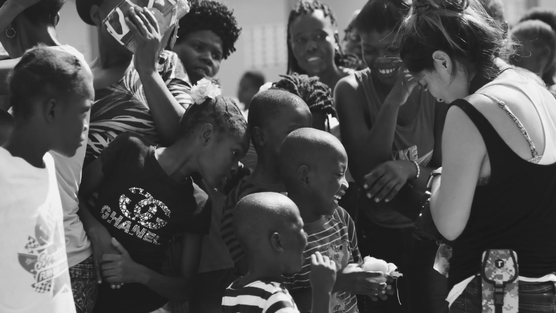 AIDS Healthcare Foundation 22 ahf haiti bts photographer with children