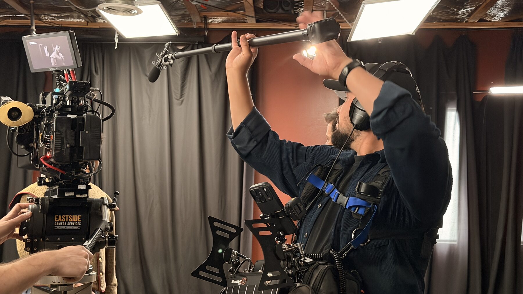 The Loudest Voice 5 Boom microphone and cinema camera framed together on set