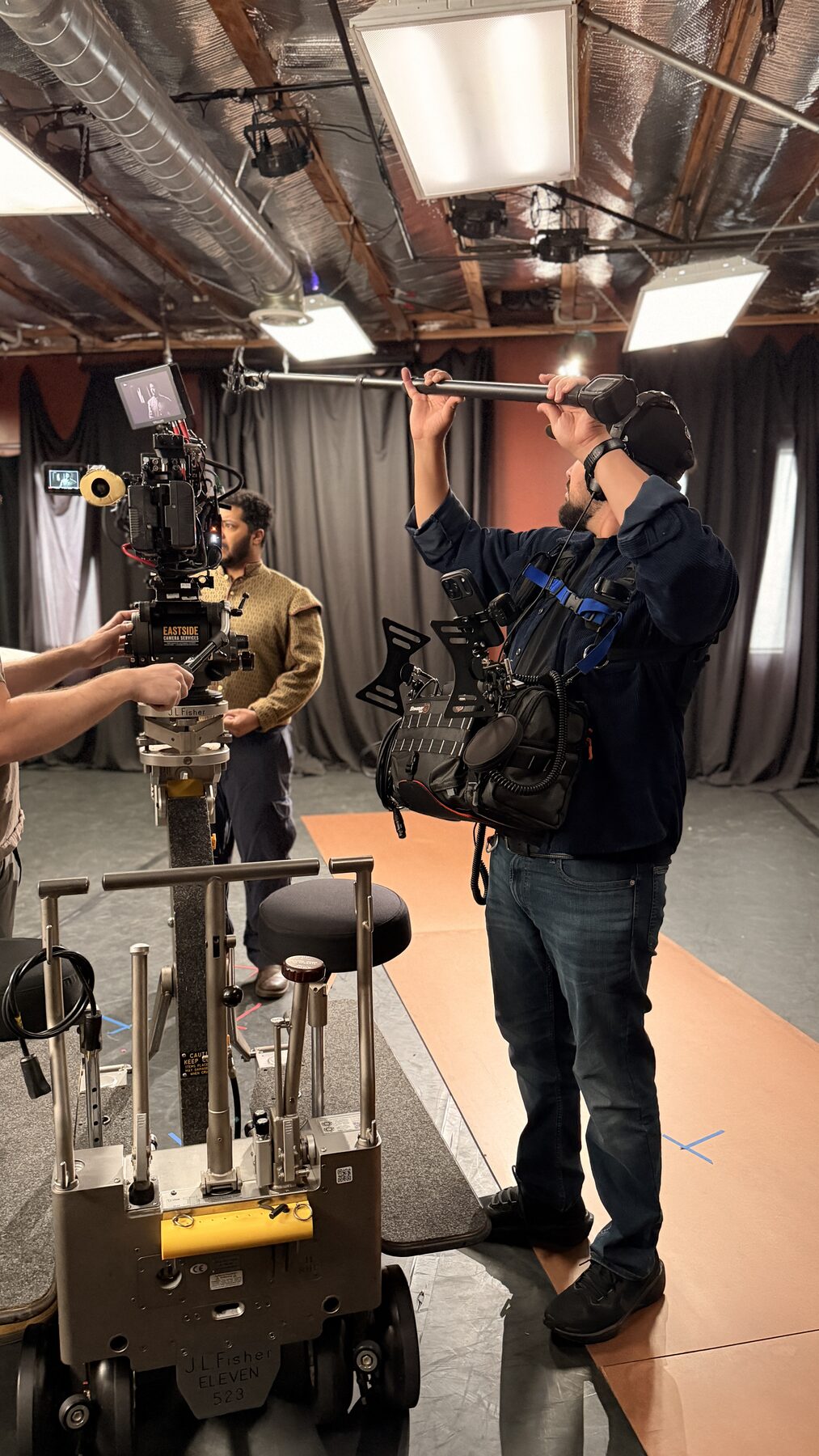 The Loudest Voice 12 Crew building a camera setup on a Los Angeles sound stage