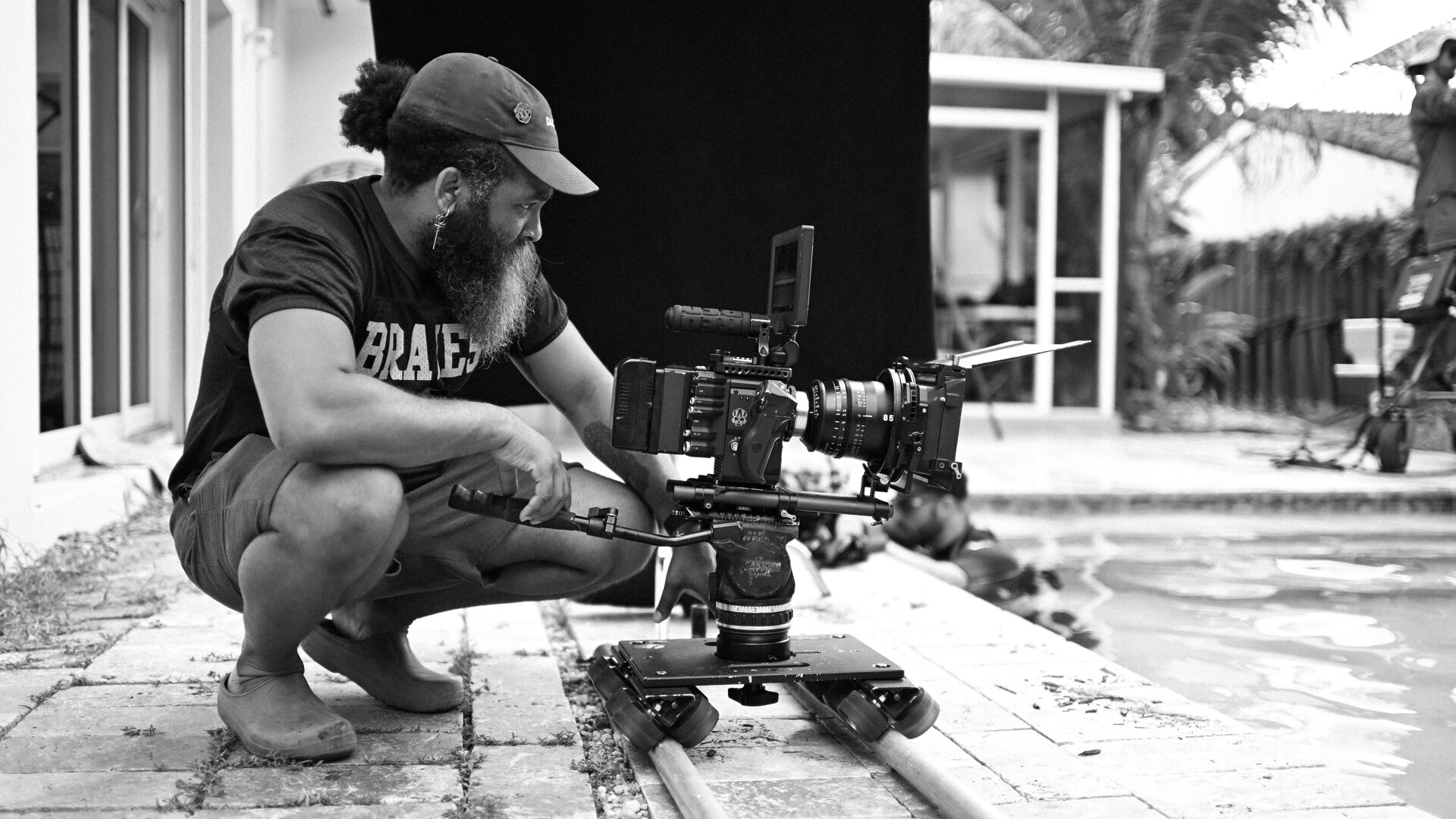 BeatBot 21 Camera operator on dolly track at the pool edge during the BeatBot shoot