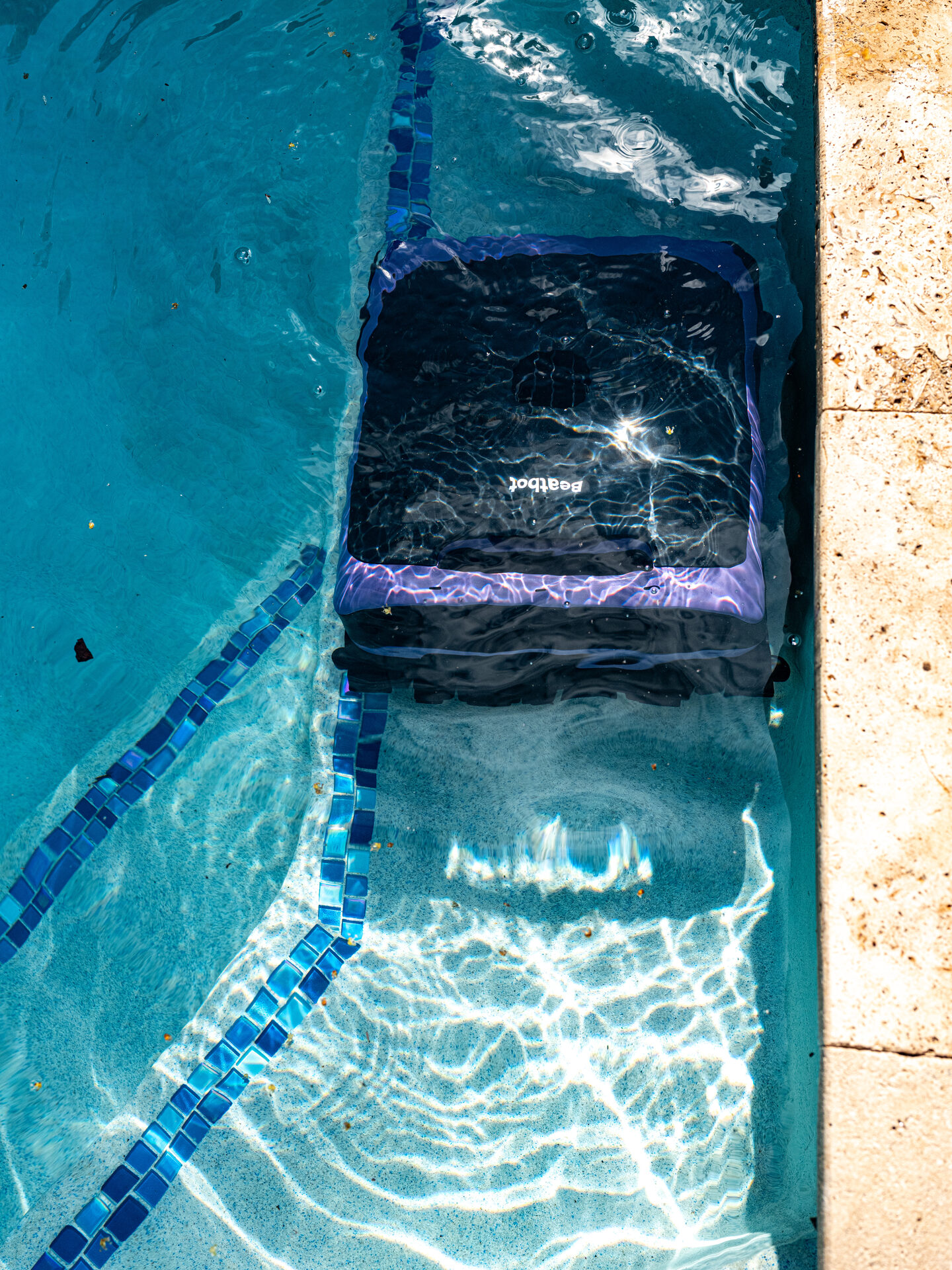 BeatBot 17 Overhead photograph of the BeatBot Sora 70 cleaning a pool