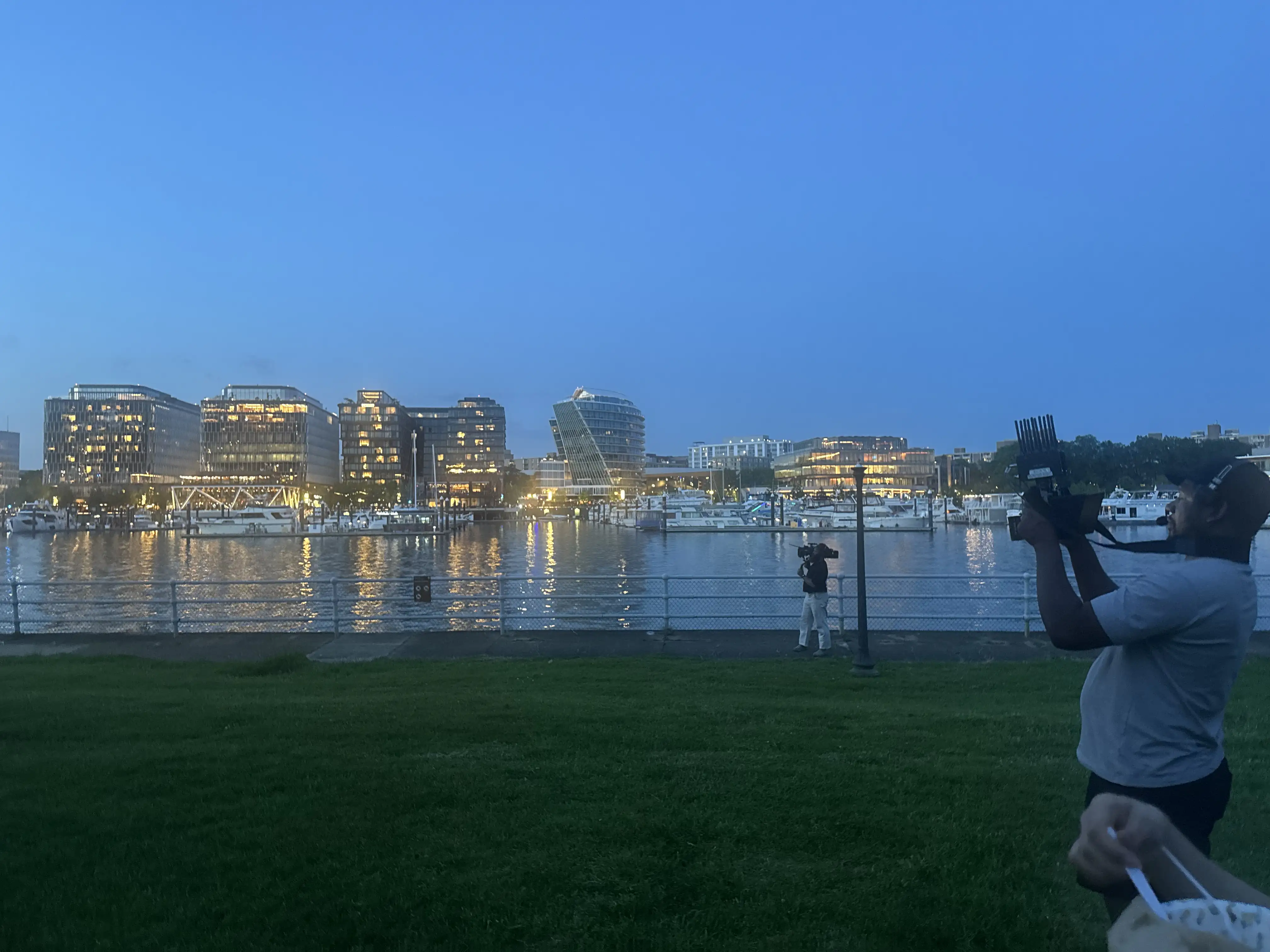 Do Video Production Companies Travel for On-Location Shoots? 2 C&I Studios crew filming on location at dusk during an out-of-state shoot