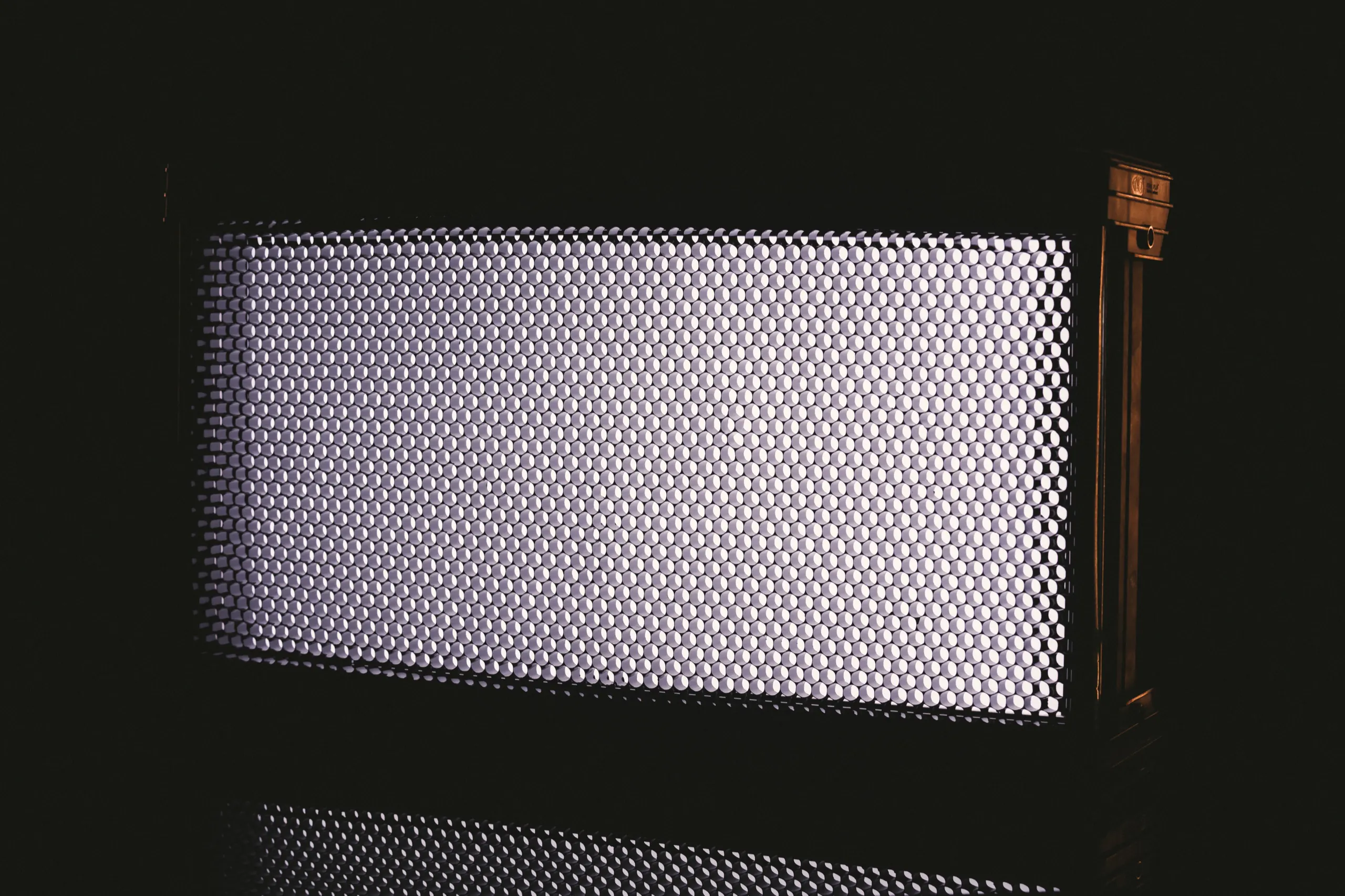 Lighting 12 Litepanels Gemini 2x1 LED panel with a honeycomb grid on a C&I Studios stage