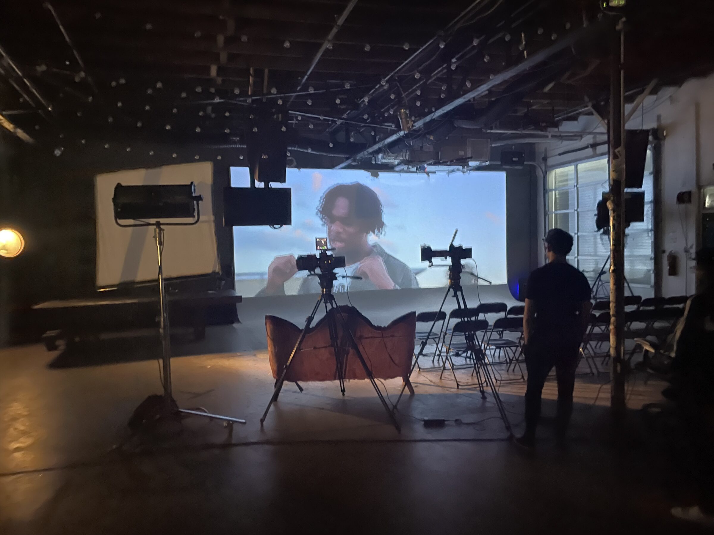 Fund Black Tech 18 Documentary footage projected on set