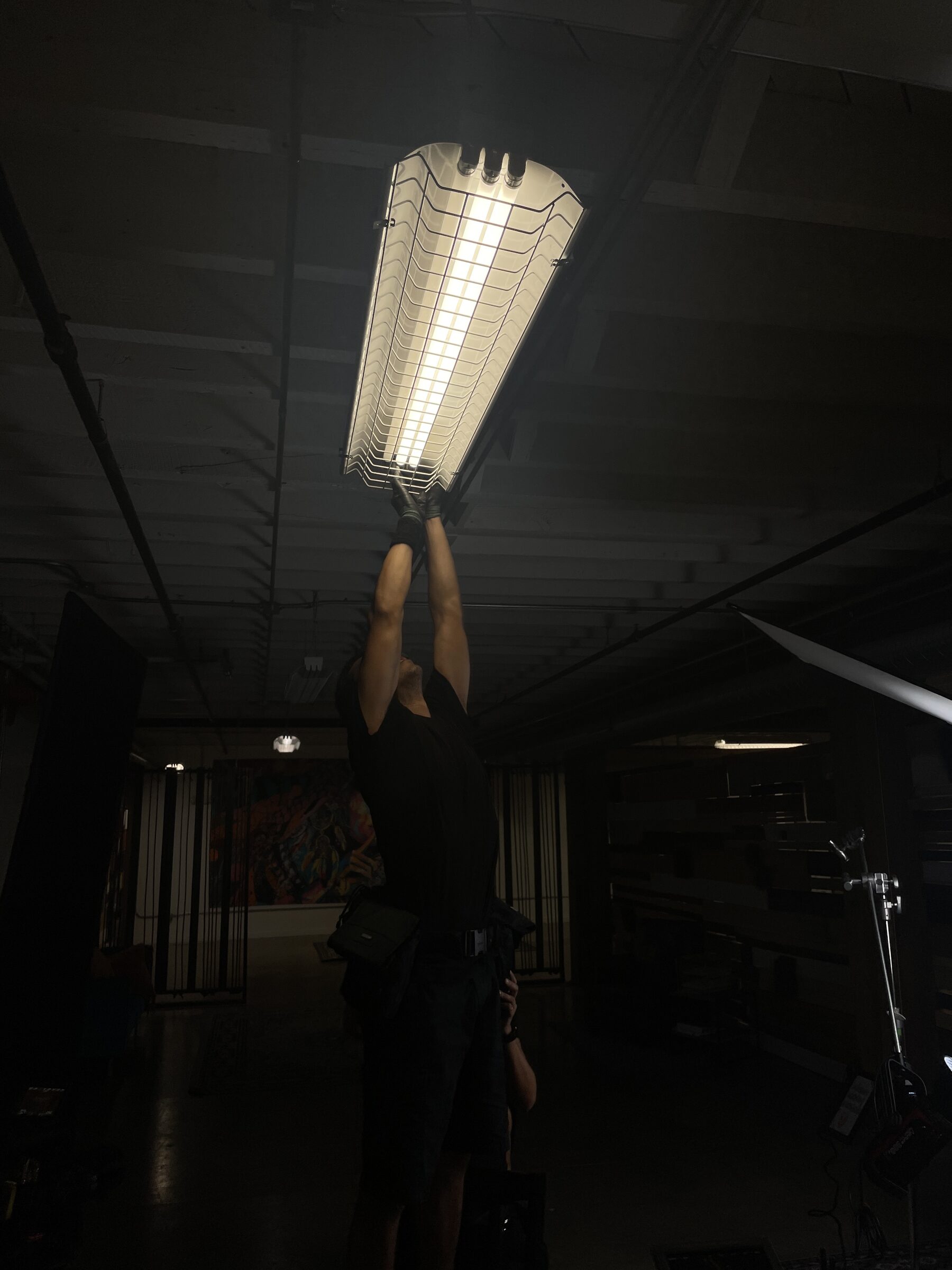Fund Black Tech 17 Rigging an overhead light for a documentary interview