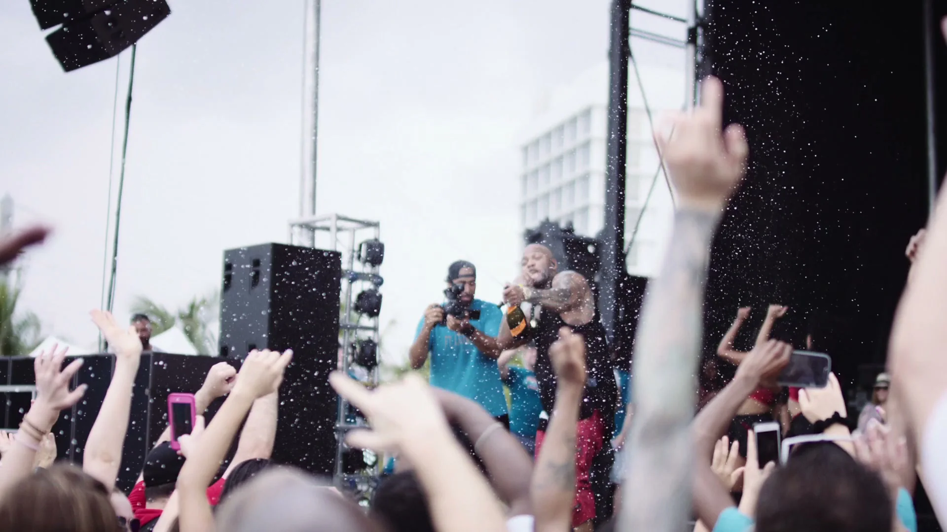 Concert video production crowd hands spray by C and I Studios