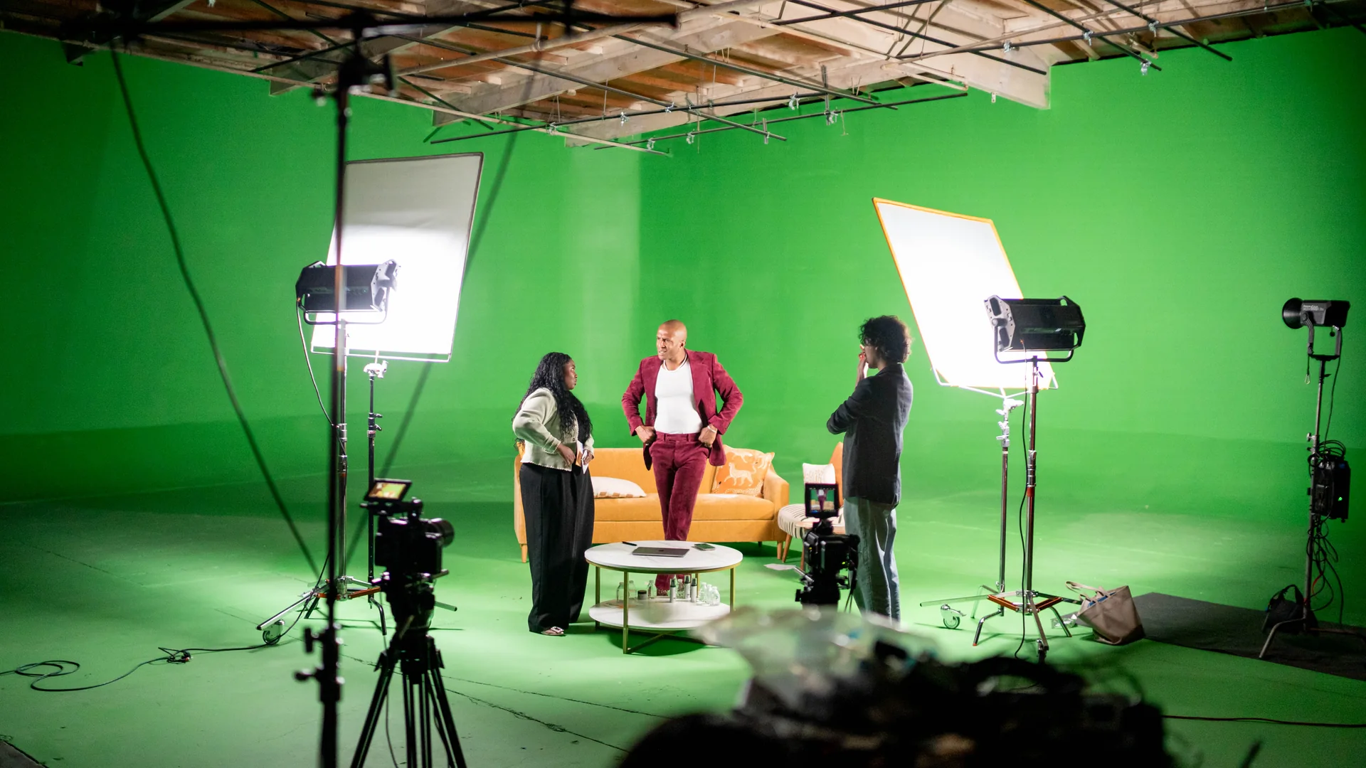 Los Angeles Studio Rental. Inside Our 30,000 Sq Ft Studio 6 Talent lit with separation from the green cyc wall during a shoot at the Los Angeles studio rental