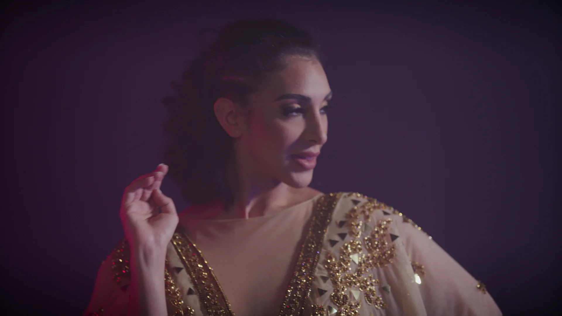 Dance video production portrait of a dancer in a beaded gown