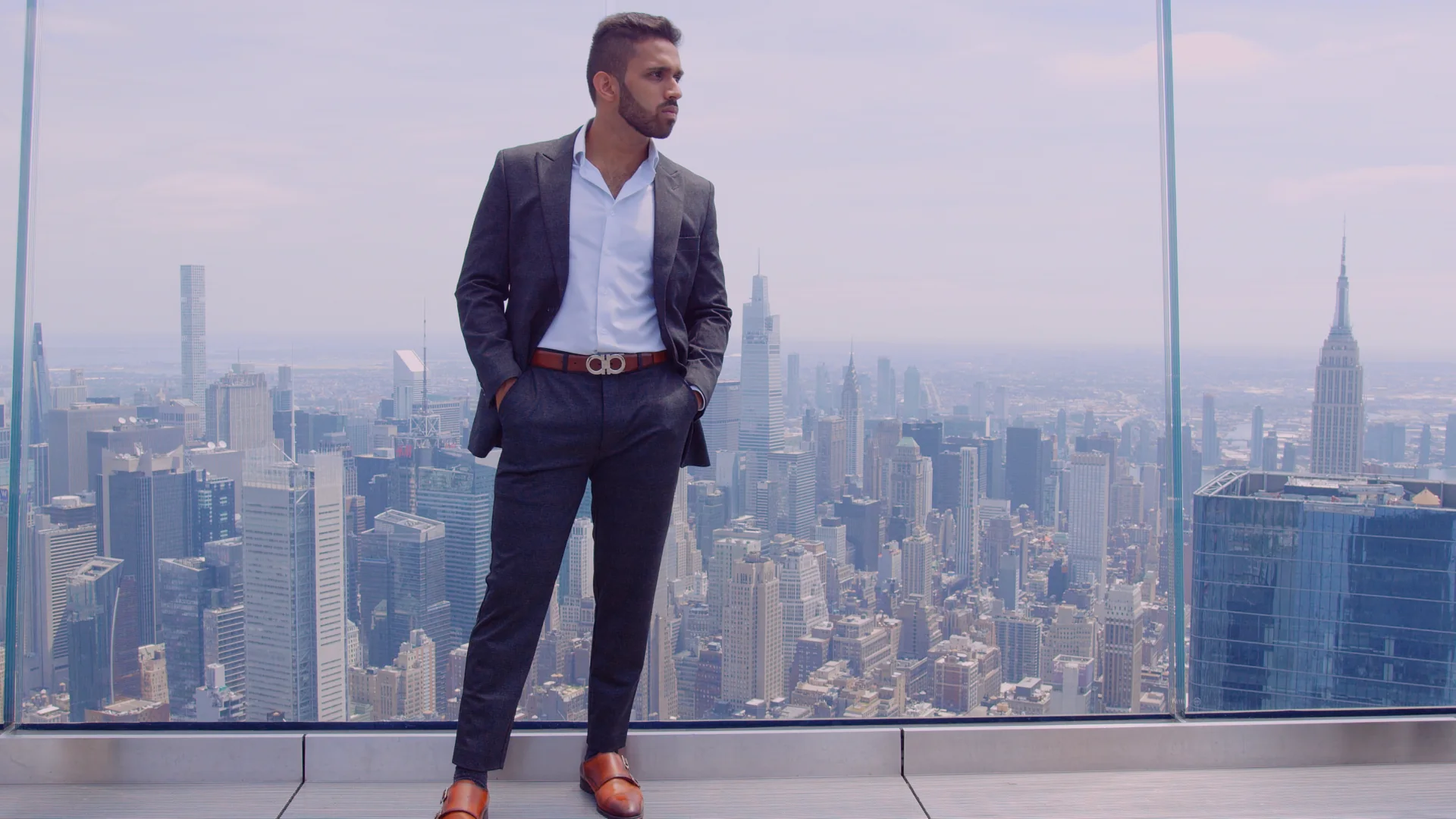 The Cities We Shoot In and Why Brands Pick Each 3 Talent on a Manhattan observation deck with the New York skyline behind on a national video production company shoot