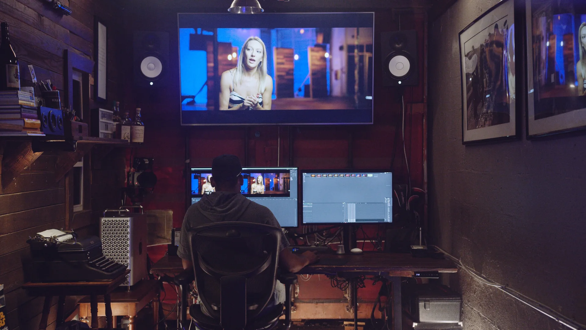 What a DCP Is and When Your Film Needs One 3 Editor reviewing a cut on the client monitor in a C&I Studios edit suite