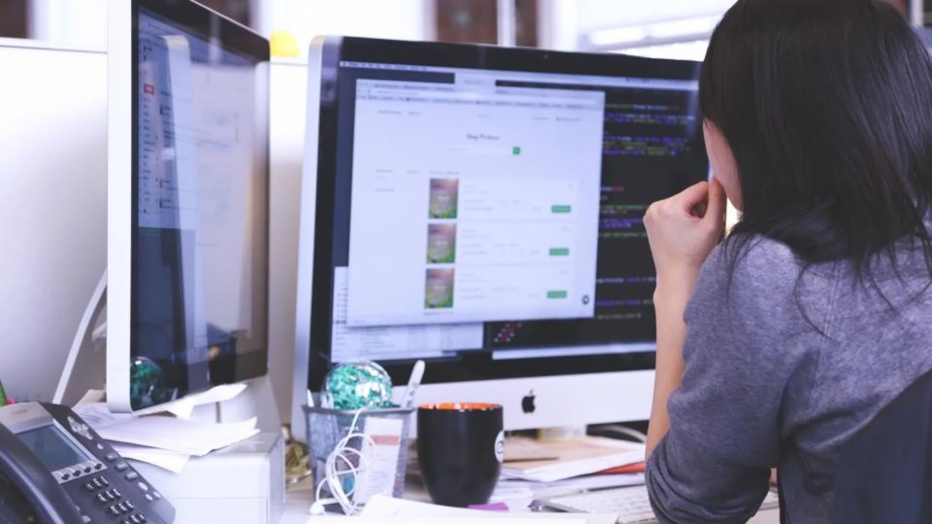 What Managed Website Security Actually Protects Your Business From 1 A team member reviewing a live website on screen, the kind of site C&I Studios keeps monitored and protected