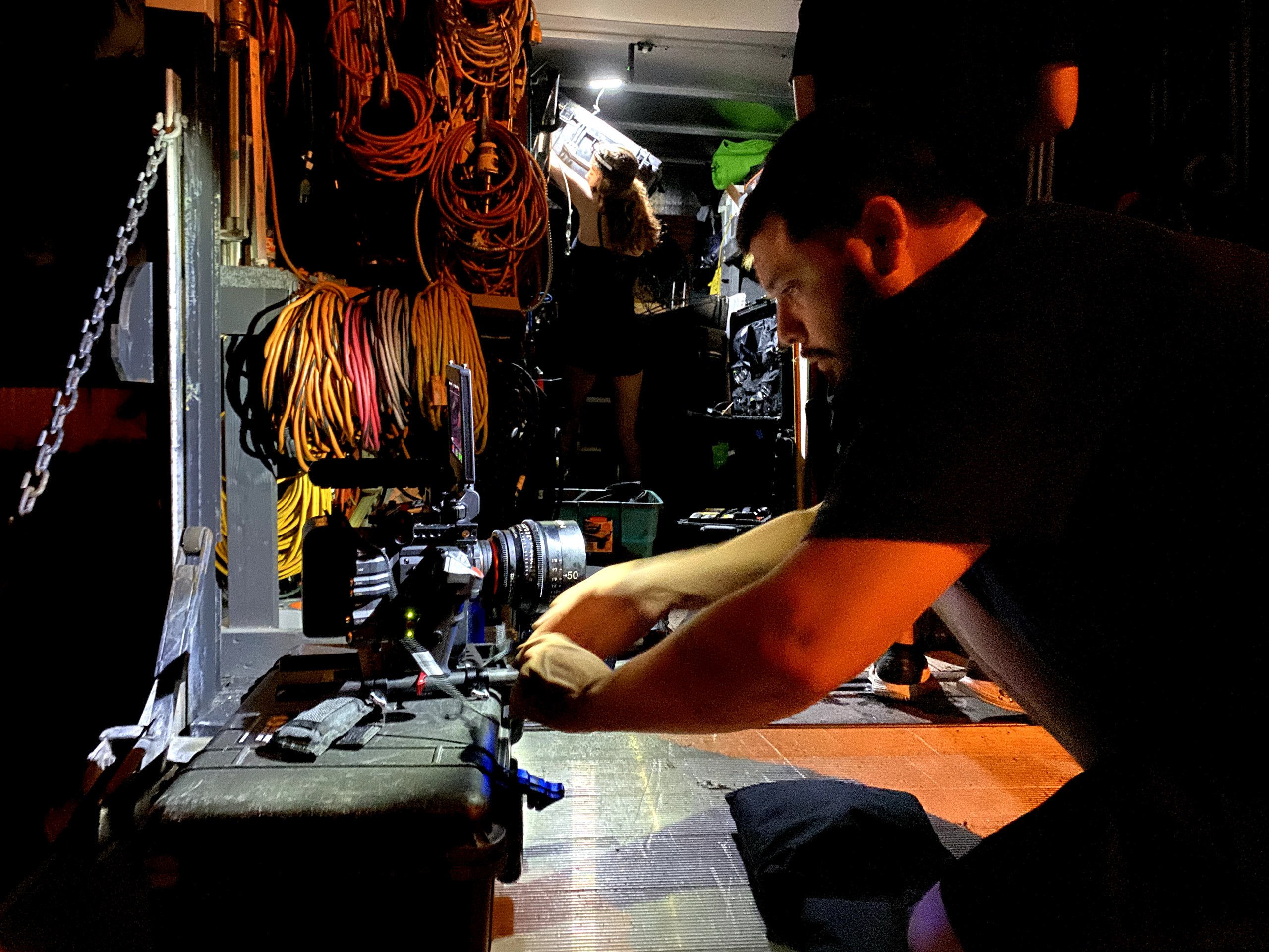 Grip Trucks 3 Crew member building a camera at the back of the C&I Studios grip truck with stingers and cable coiled behind