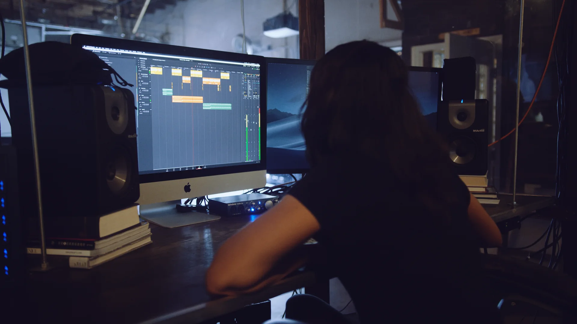 A Look Inside Our Post-Production Pipeline 1 Sound editor mixing a project at a C&I Studios audio workstation
