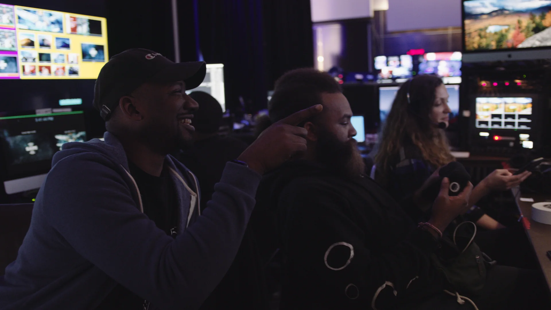 A Look Inside Our Post-Production Pipeline 2 C&I Studios post team reviewing footage together at the monitor wall