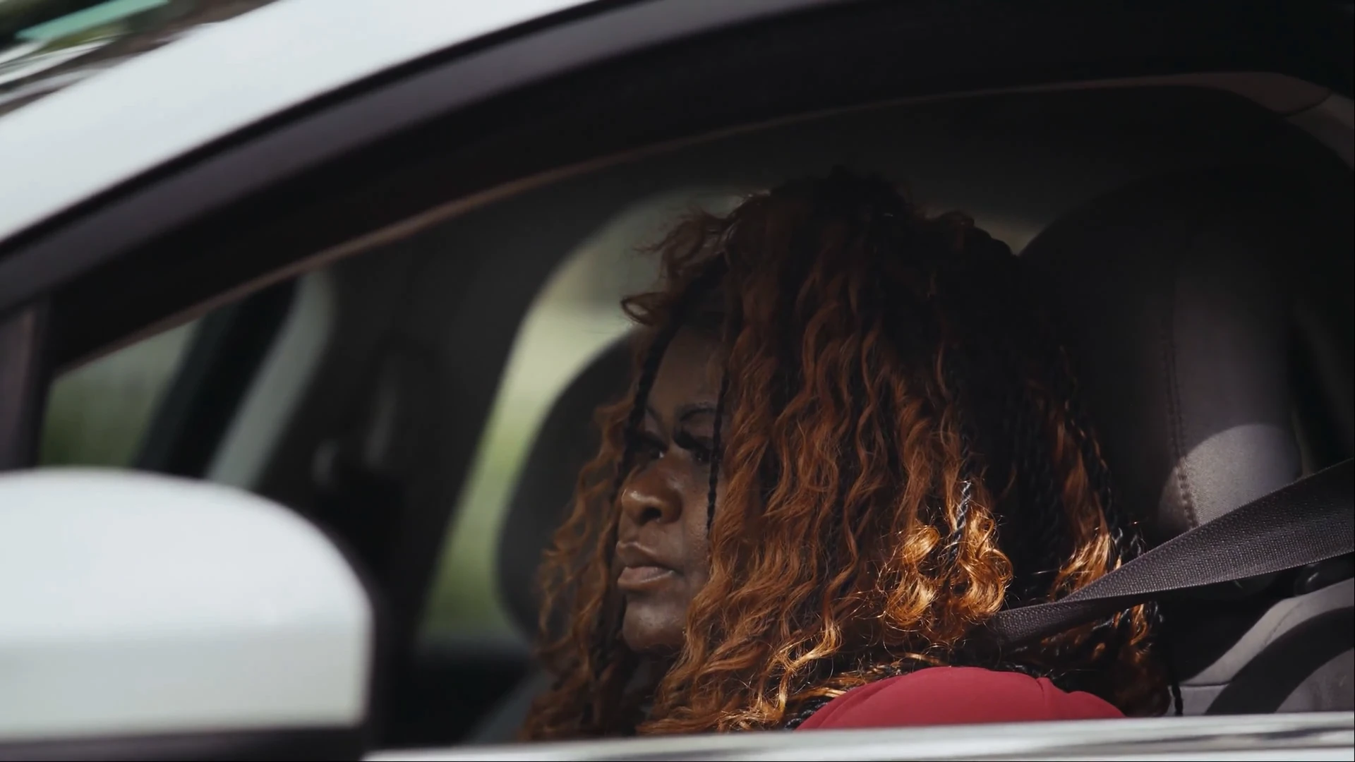 Albany resident behind the wheel of her car