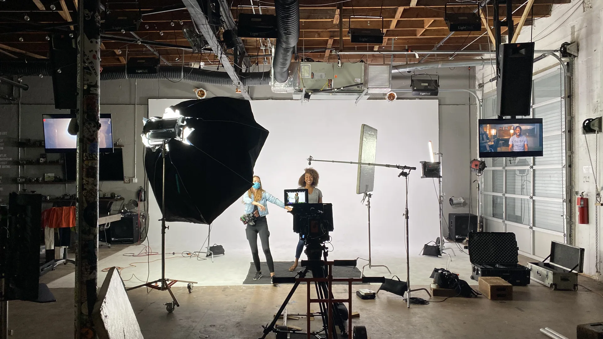 C&I Studios crew lighting a white cyc for the Amendment 3 testimonial shoot