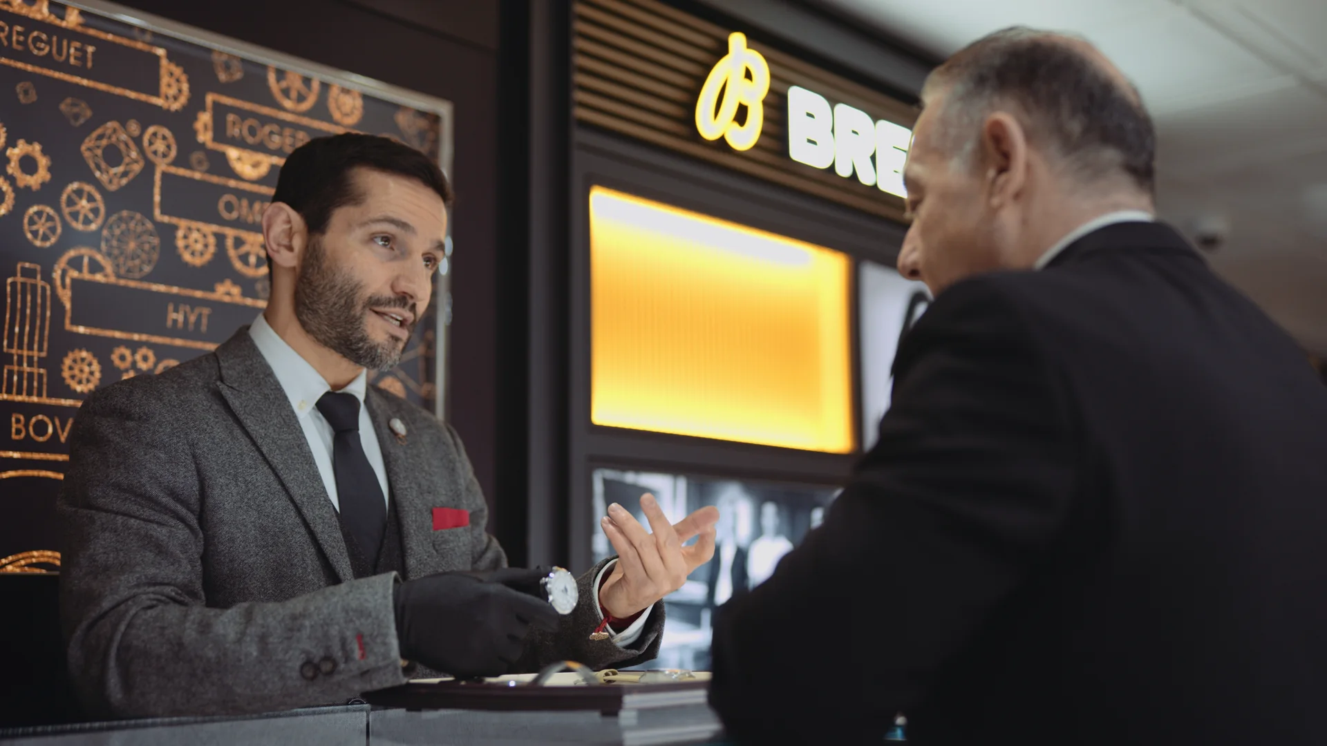 What a Corporate Video Actually Delivers for a Brand 2 Watch boutique specialist walking a client through a timepiece, filmed by C&I Studios